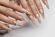 Glam Up Your Nails: Mesmerizing Nail Designs with Gems